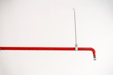Fire Sprinklers hang on ceiling