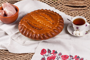 Pie on the table with food set