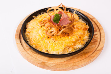 fried potatoes with cheese and meat