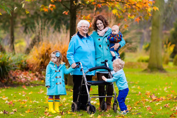 Senior lady with walker enjoying family visit