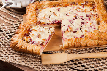 Pie on the table with food set