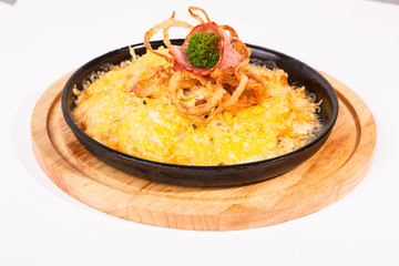 fried potatoes with cheese and meat