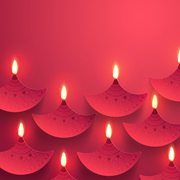 Diwali celebration background, Decorated by Lit Lamps (Diya).