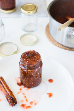 Homemade fig jam in small jar. Selective focus.