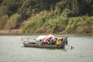 Typical vietnamese wood boat on the Mekong river