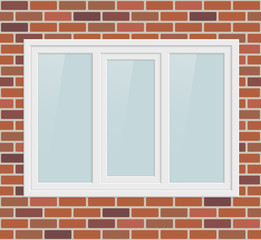 Triple metal plastic window in brick wall