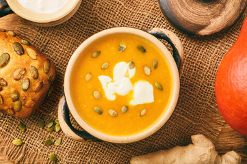Pumpkin cream soup with ginger and pumpkin seeds.