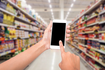 Worker Using Tablet Computer In Distribution Warehouse