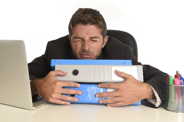  exhausted businessman suffering stress at office computer desk