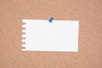 White Paper A To Do List pinned to a cork notice board.