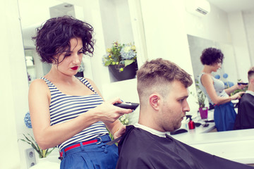 The young man at the hairdresser salon hairstyle make model