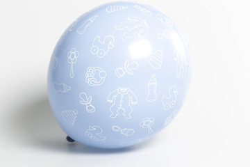 Blue toy balloon on a white background