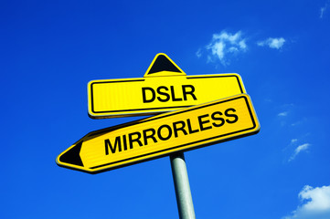 DSLR or Mirrorless - Traffic sign with two options - photographer's dilemma of choosing technological system of camera. Single reflex camera vs construction without mirror
