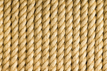 Vertical strands of rope as background © Ozgur Coskun