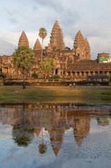 Angkor Wat Temple near sunset looking across the Southern Reflecting Pool. Angkor Temple Comples, Siem Reap, Cambodia, Asia