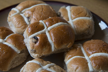 Hot cross buns waiting to be toasted, buttered and eaten at Easter