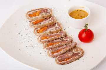 stuffed pork ears on plate