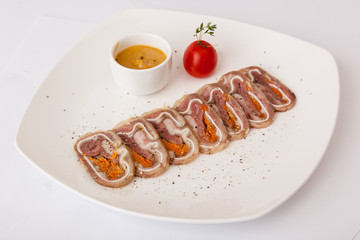 stuffed pork ears on plate