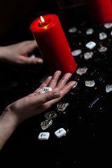 runes in the hand of the witch
