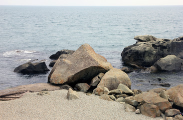 Fototapeta na wymiar beautiful picturesque wild Black sea coast with boulders and roc