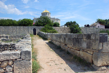 stone ruins on street of ancient Greek city of Chersonesos in Cr