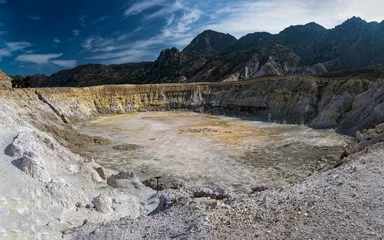Wandaufkleber Panoramic view of the largest crater of the active volcano in Nisyros island, Greece © dinosmichail