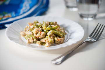 Pieces of chicken with green beans