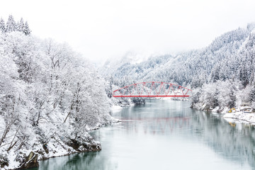 Red bridge winter landscape