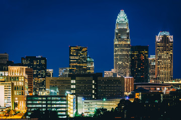 Fototapeta na wymiar View of the skyline of Uptown at night, in Charlotte, North Caro