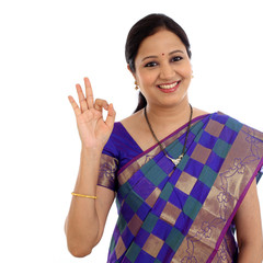 Traditional Indian Young woman making OK sign - 121381241