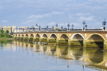 Pont de pierre or Stone Bridge, a bridge in Bordeaux, France on Garonne River