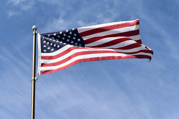 American flag against a blue sky