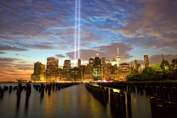 New York City Manhattan skyline with Tribute in Light - obrazy, fototapety, plakaty