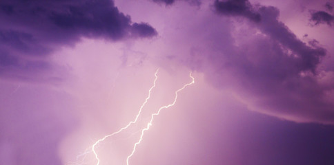 Thunder lightnings and storm on the dark sky