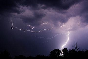 Thunder lightnings and storm on the dark sky