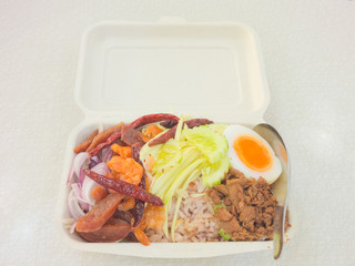 Thai style fried rice mixed with shrimp paste served in foam box
