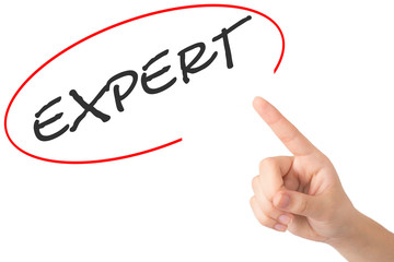 Hand of a young girl points to a word