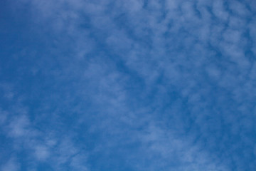 White clouds on a blue sky. Selective focus
