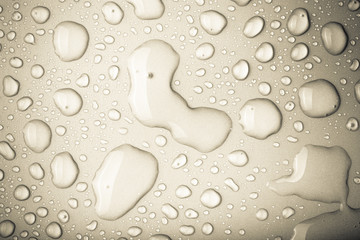 Drops of water on a color background. Toned