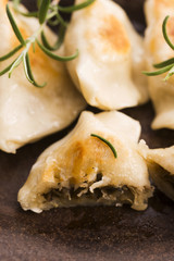 Polish pierogi filled with cabbage and mushrooms