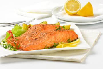 dish of salmon fillets with roasted potatoes