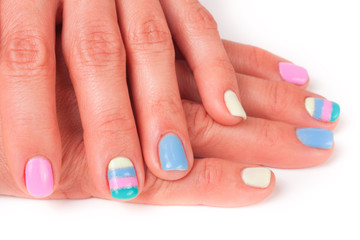 colorful manicure close-up isolated on white background