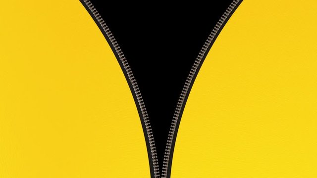 Opening zip fastener on yellow leather material.
