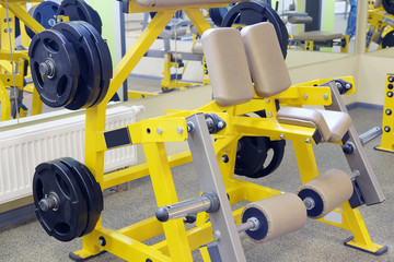 Interior of a fitness hall with wights and other sport equipment