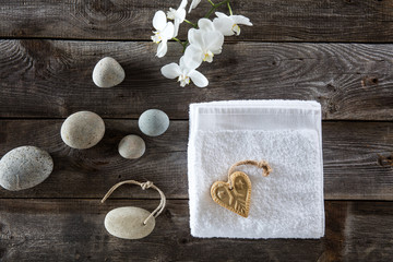 flat lay still life for valentines spa on wood background