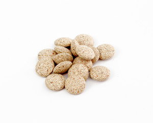 Close Up of Plain Compress pills of Medicinal Herb Powder