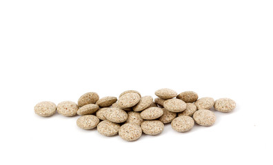 Close Up of Plain Compress pills of Medicinal Herb Powder