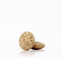 Close Up of Plain Compress pills of Medicinal Herb 