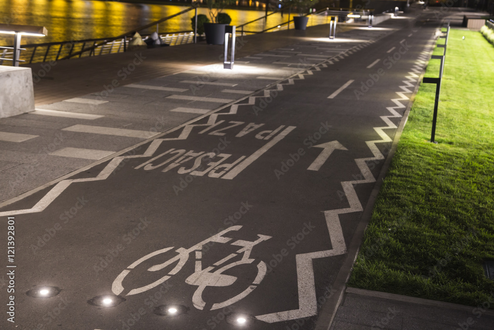 Wall mural The bicycle sign on the grey road in the public park for biking