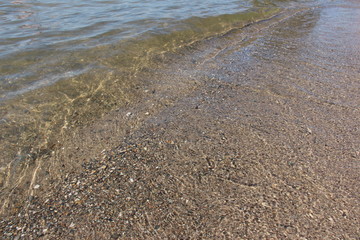Wave of the sea on the sand beach